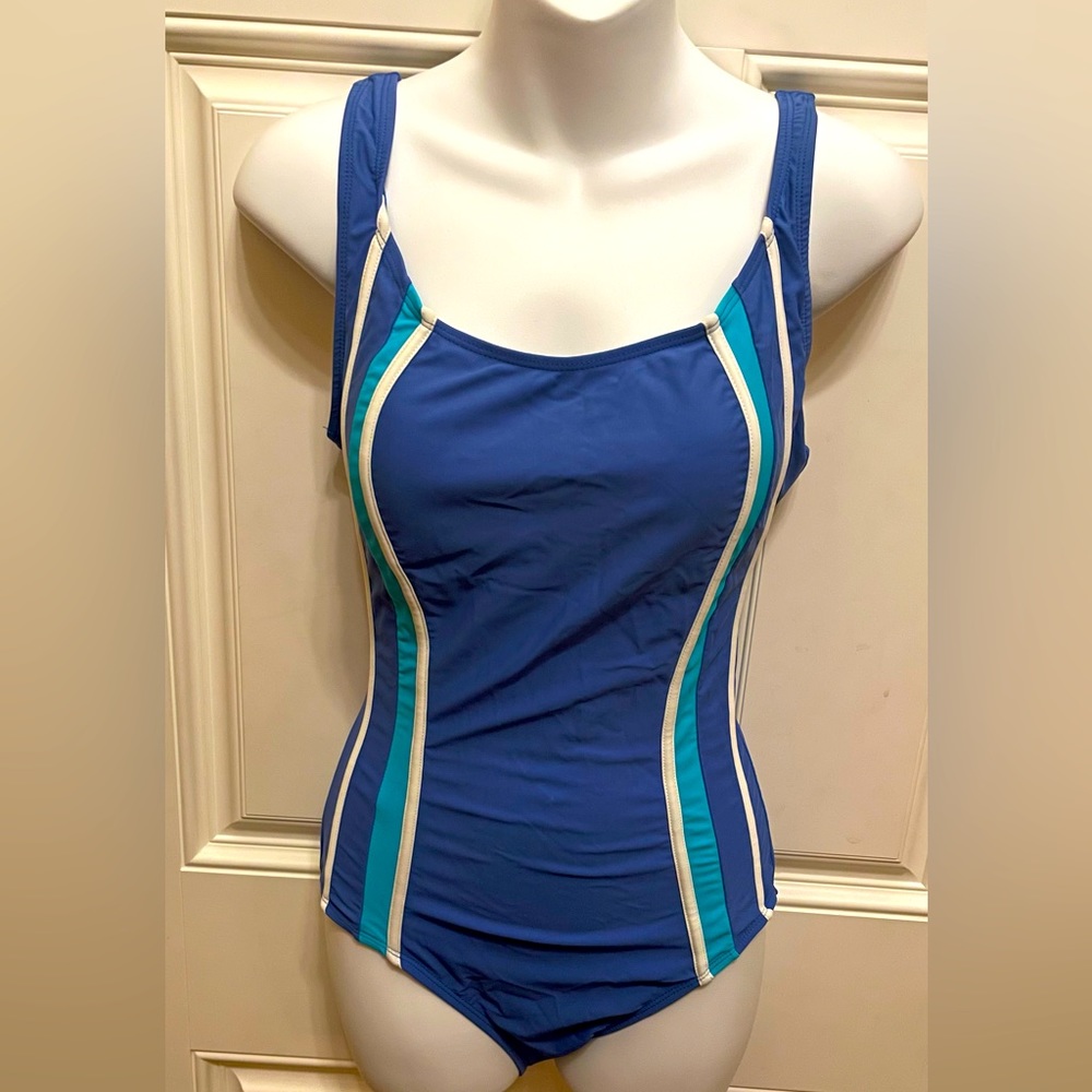 Krista Size 12 one piece light blue bathing suit with side stripes.